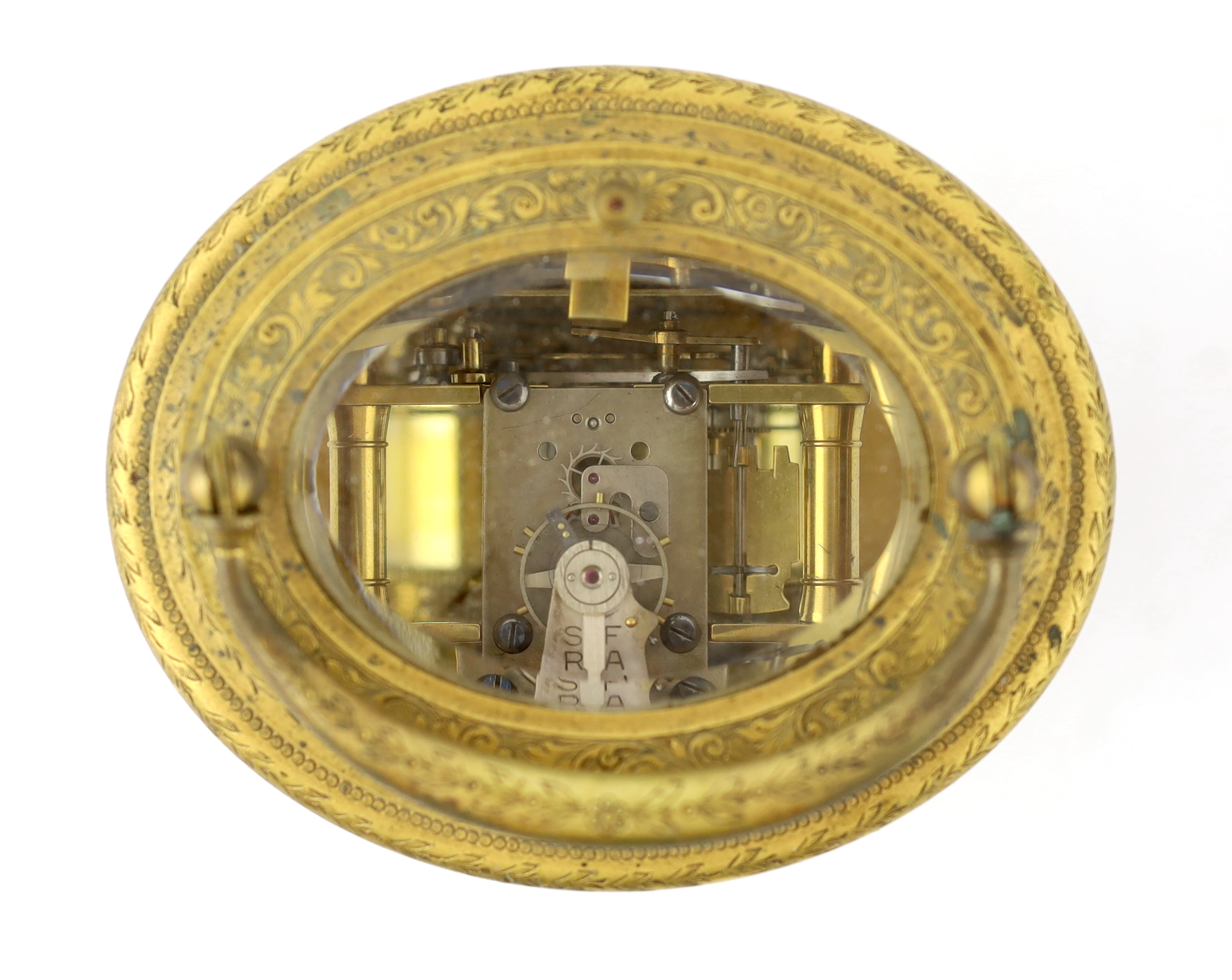 Drocourt & Co., a late 19th century French hour repeating ormolu oval cased carriage clock, 13.5cm high